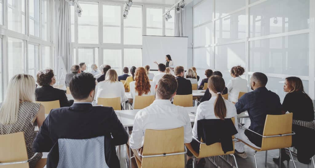 Indian businesswoman leading a seminar.