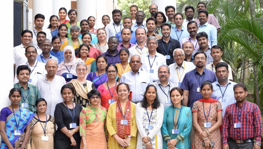 Rows of doctors in India wearing badges