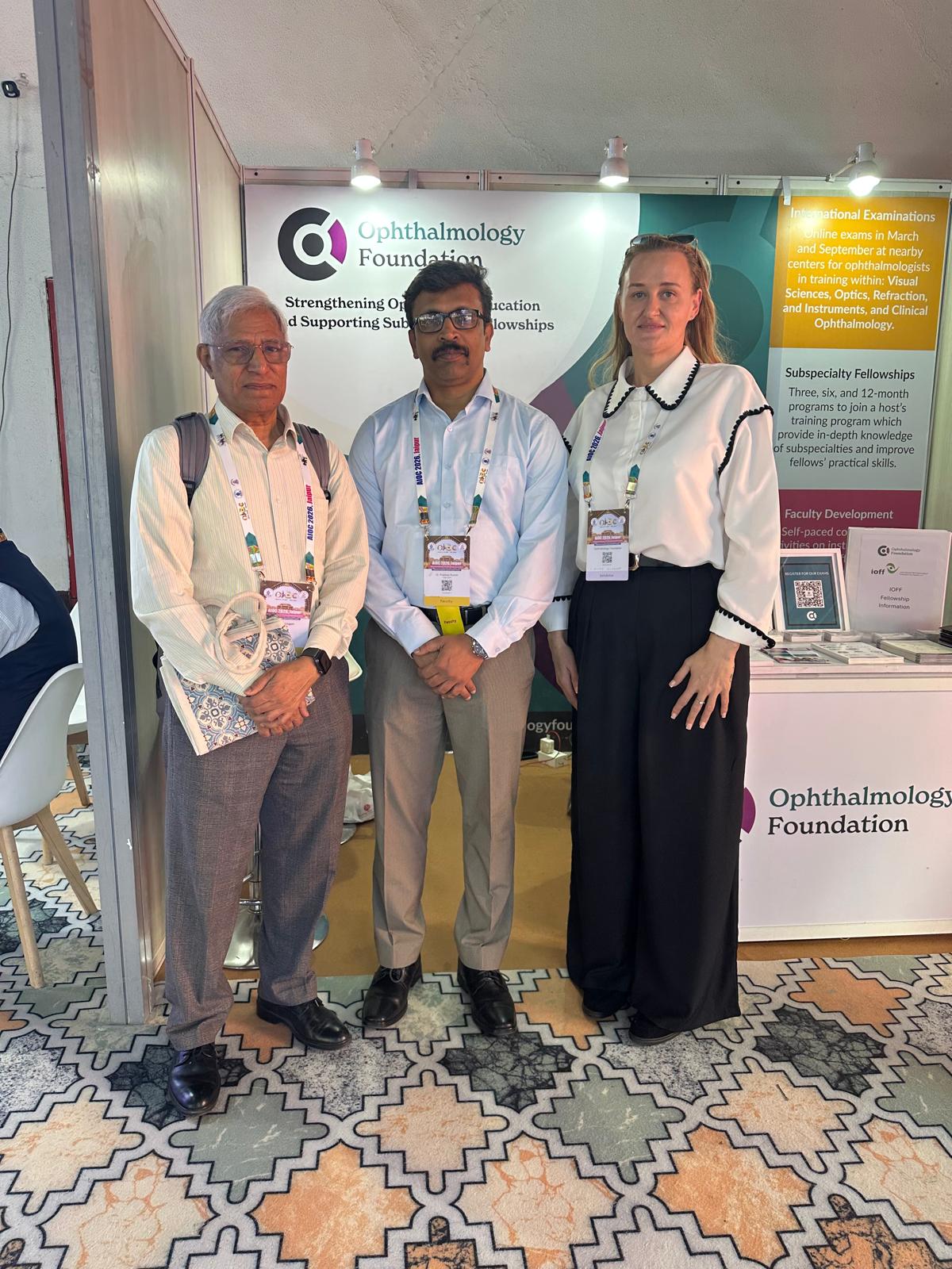Group of people in 7 rows in India with conference badges