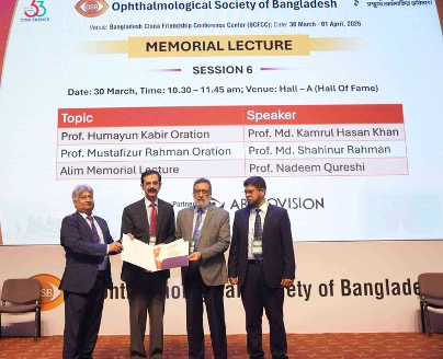 Four men standing in front of a screen at a conference in Bangladesh